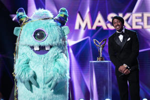 Monster and Nick Cannon in Fox's The Masked Singer. - Credit: Fox