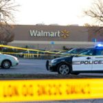 Police officers work at the site of a mass shooting at Walmart in Chesapeake, Virginia on Wednesday, November 23, 2022. The store was packed Tuesday night as people stocked up ahead of Thanksgiving.